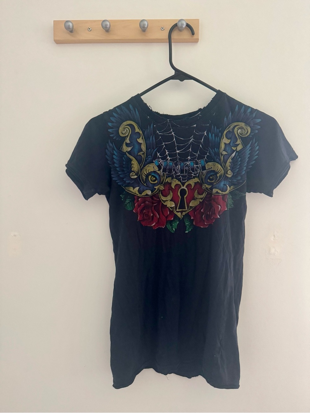 Sinful Black Tee with Blue Wing, Red Rose & Gold Keyhole Graphic
